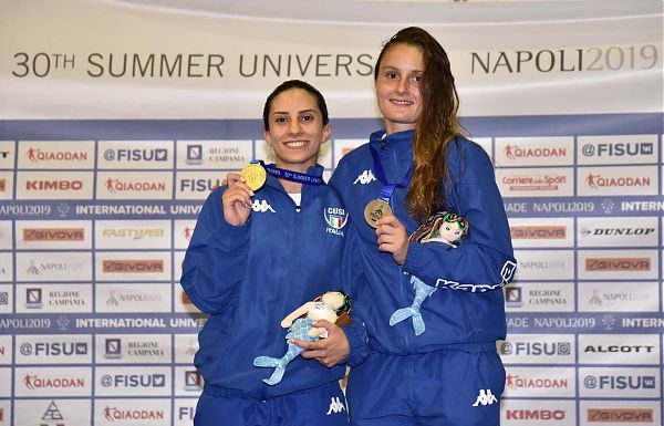 PRIMO ORO AZZURRO NEL FIORETTO CON ERICA CIPRESSA
