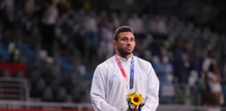 Myles Nazem Amine Mularoni portabandiera cerimonia chiusura