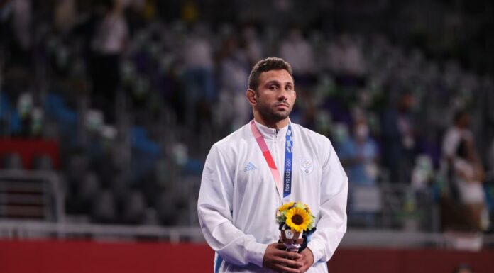 Myles Nazem Amine Mularoni portabandiera cerimonia chiusura