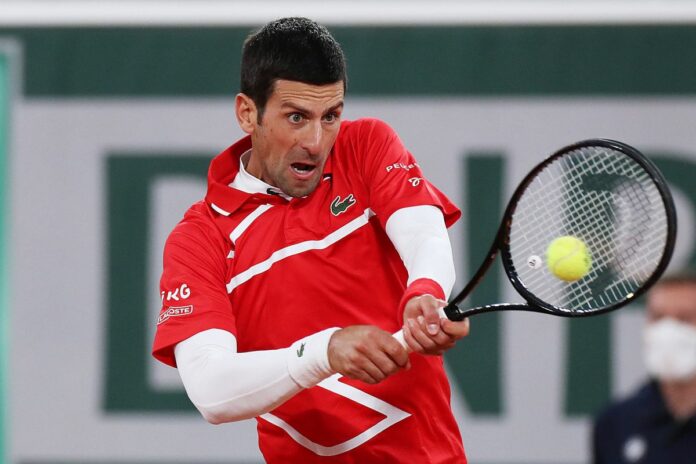 (201011) -- PARIS, Oct. 11, 2020 -- Novak Djokovic of Serbia hits a return during the men s singles final match against