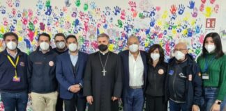 Covid, Vescovo di Palermo visita l’hub vaccinale della Fiera