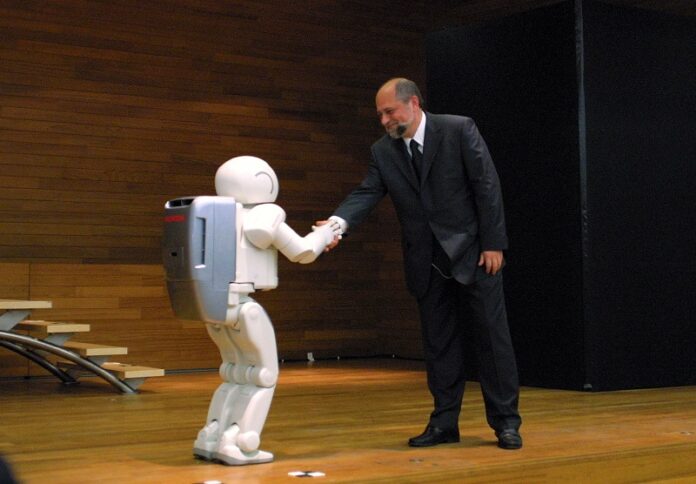 PRESENTAZIONE DEL ROBOT ASIMO DELLA HONDA DURANTE IL CONVEGNO GIAPPONE OGGI ECONOMIA E INNOVAZIONE TECNOLOGICA ALL'UNIVERSITA' BOCCONI DELLA