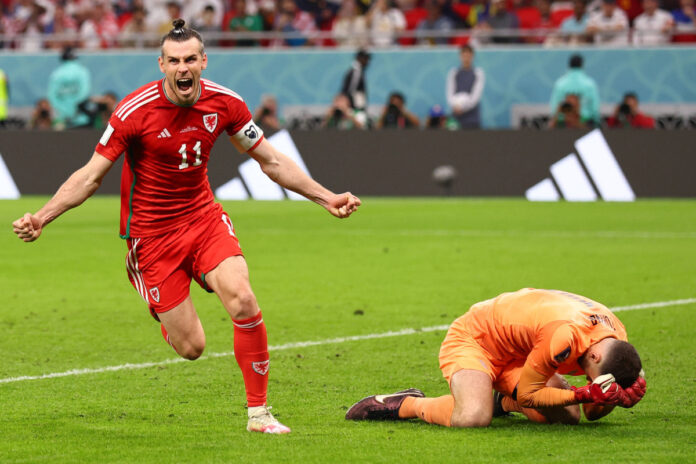 Al Rayyan, Qatar, 21st November 2022. Gareth Bale of Wales celebrates scoring the equalising goal during the FIFA World