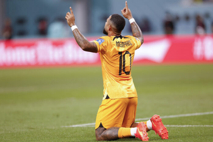 (221203) -- DOHA, Dec. 3, 2022 -- Memphis Depay of the Netherlands celebrates after scoring during the Round of 16 match