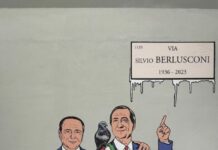 Milano, nel quartiere Isola il murales “l’unità” con Berlusconi e Sala