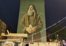 Sinergia Amg Energia-Comune Palermo, illuminato murale di Biagio Conte