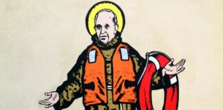 Alla Caritas di Milano murale di Papa Francesco con un giubbotto salvagente e il piccolo migrante morto
