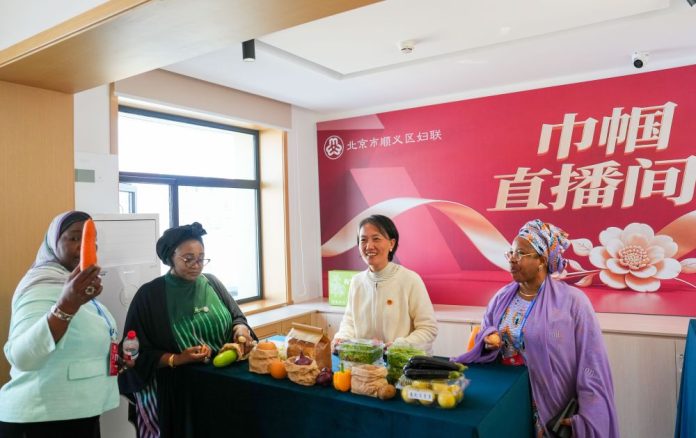 CHINA-BEIJING-GLOBAL LEADERS' MEETING ON WOMEN-SOCIAL SERVICE CENTER FOR WOMEN & CHILDREN-VISIT (CN)