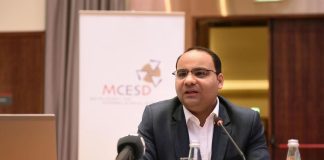 Finance Minister Caruana urges caution as Malta weighs global tax shift