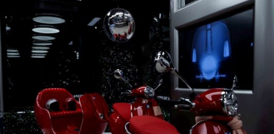 Lo spirito del Natale Incontra Vespa nel cuore di Milano