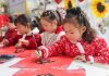 Cina: i bambini celebrano il nuovo anno con attività tradizionali (1)