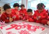 Cina: i bambini celebrano il nuovo anno con attività tradizionali (3)