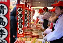 Cina: Qingdao ospita fiera di frutta candita per Festa di primavera (2)