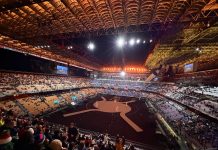 Iniziata la cerimonia di apertura di Milano-Cortina 2026, Mattarella arriva a San Siro su un tram guidato da Valentino Rossi