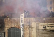 Corteo contro le Olimpiadi a Milano, scontri tra manifestanti e polizia