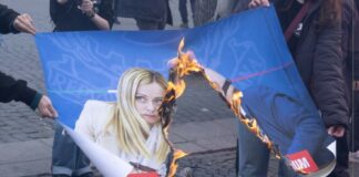Corteo a Roma, bruciate immagini con Meloni e Nordio