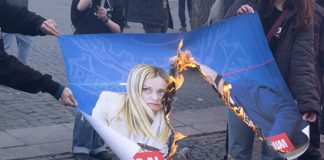 Corteo contro guerra e referendum a Roma, bruciate foto di Meloni e Nordio