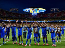 Dutch royals join the celebrations in the Curaçao dressing room after the team secures its first World Cup point
