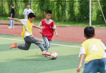 Cina: bambini delle zone rurali inseguono sogni calcistici nell’Anhui (1)