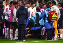 Jordan Henderson falls during celebrations and injures his arm