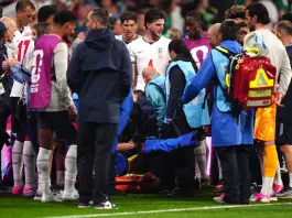 Jordan Henderson falls during celebrations and injures his arm