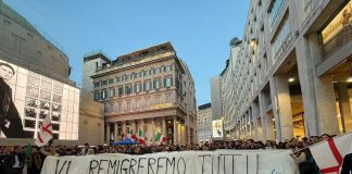 Tensioni a Milano alla manifestazione del centrodestra, schermaglie e urla per lo striscione “Vi remigreremo tutti”